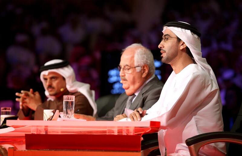 Sultan Al Ameemi, right, with members of the Million’s Poet judging panel. Courtesy Sultan Al Ameemi