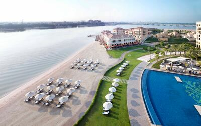 A handout photo of the pool and beach at The Ritz-Carlton Abu Dhabi, Grand Canal (Courtesy: The Ritz-Carlton Abu Dhabi, Grand Canal) *** Local Caption ***  wk15ap-family-ritz01.jpg