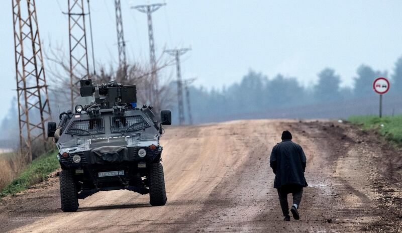 epa06469757 Turkish soldiers patrol near Syrian-Turkish border, at Hatay, Turkey, 24 January 2018. Reports state that the Turkish army is on an operation named 'Operation Olive Branch' in Syria's northern regions against the Kurdish Popular Protection Units (YPG) forces which control the city of Afrin. Turkey classifies the YPG as a terrorist organization.  EPA/SEDAT SUNA