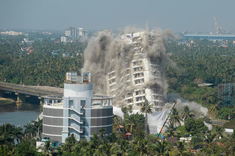 An apartment complex is pictured during a controlled implosion ordered by the Supreme Court for violating coastal construction regulations in Kochi. AFP