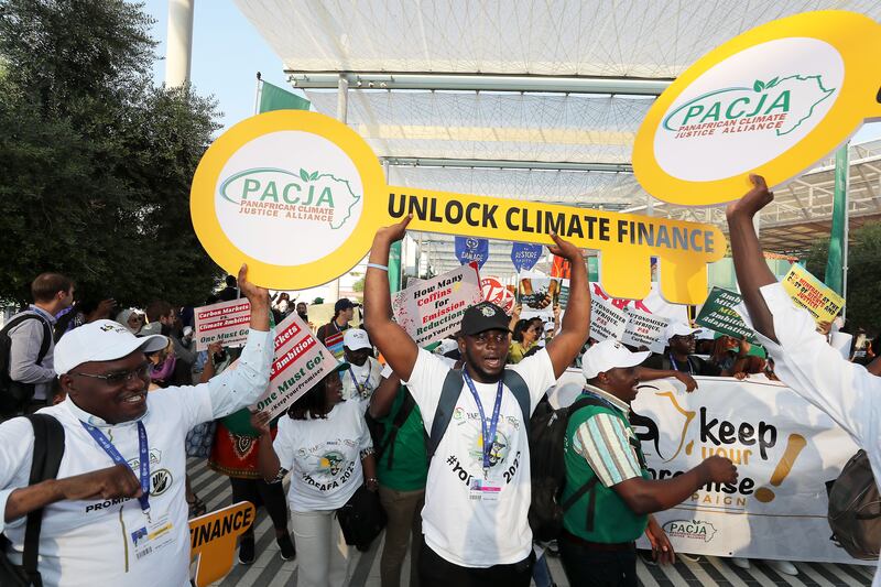 People call for climate action and funding for the developing world at Cop28. Pawan Singh / The National