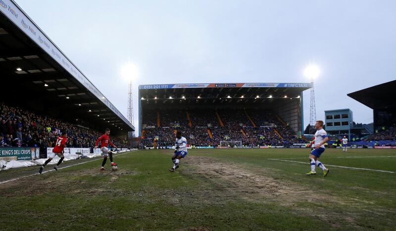 The pitch at Prenton Park was in far from ideal condition. Reuters