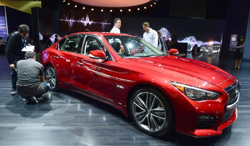 The Infiniti Q50s Hybrid at the LA Auto Show. AFP PHOTO/Frederic BROWN

