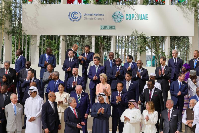 While world leaders pose for photos at Cop28, negotiations on the global stocktake are beginning in the background. AFP