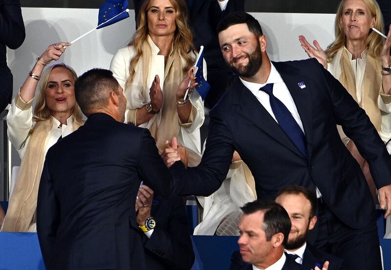 Sergio Garcia, left, and Jon Rahm shake hands after being announced as Europe's first foursomes pair for the opening session at the Ryder Cup. PA