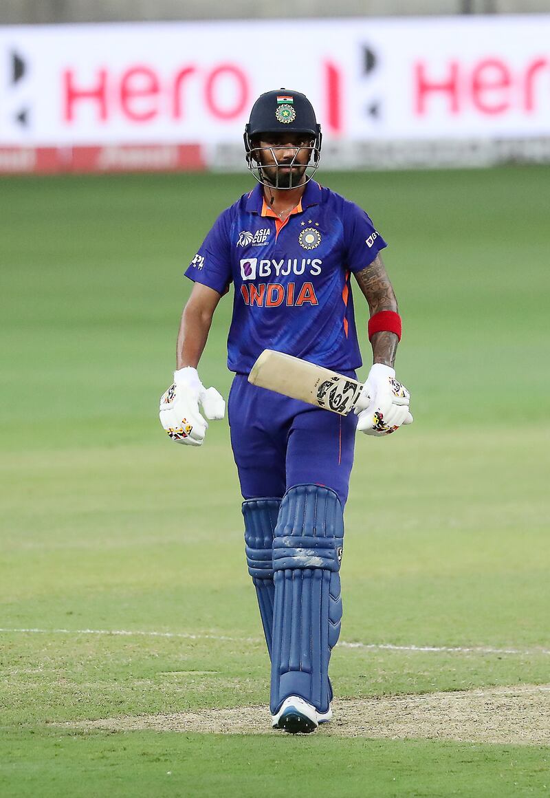 KL Rahul walks back to the pavilion after being bowled by Shadab Khani. Pawan Singh / The National