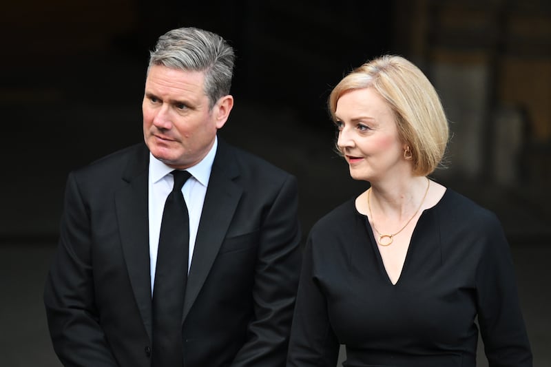 Mr Starmer and then-UK prime minister Liz Truss leave the Palace of Westminster in September 2022. Getty Images