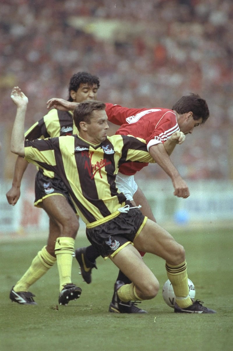 17 May 1990:  Phil Barber (centre) of Crystal Palace tackles Neil Webb (right) of Manchester United during the FA Cup final replay at Wembley Stadium in London. Manchester United won the match 1-0. \ Mandatory Credit: Russell  Cheyne/Allsport