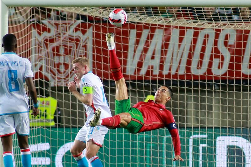 Portugal's Cristiano Ronaldo attempts to score with an overhead kick. AP Photo