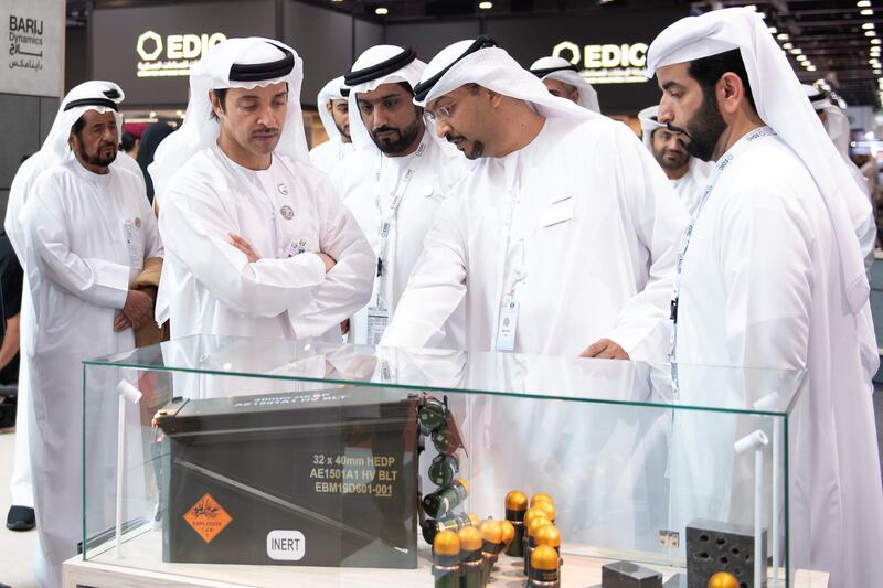 ABU DHABI, UNITED ARAB EMIRATES - February 17, 2019: HH Sheikh Hazza bin Zayed Al Nahyan, Vice Chairman of the Abu Dhabi Executive Council (L), inspects a weapon on the Barij Munition stand during a tour of the 2019 International Defence Exhibition and Conference (IDEX), at Abu Dhabi National Exhibition Centre (ADNEC).

( Saeed Al Neyadi / Ministry of Presidential Affairs )
---