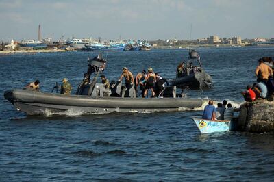 Egyptian military boats arrive at the port city of Rosetta, 250km north of Cairo. EPA