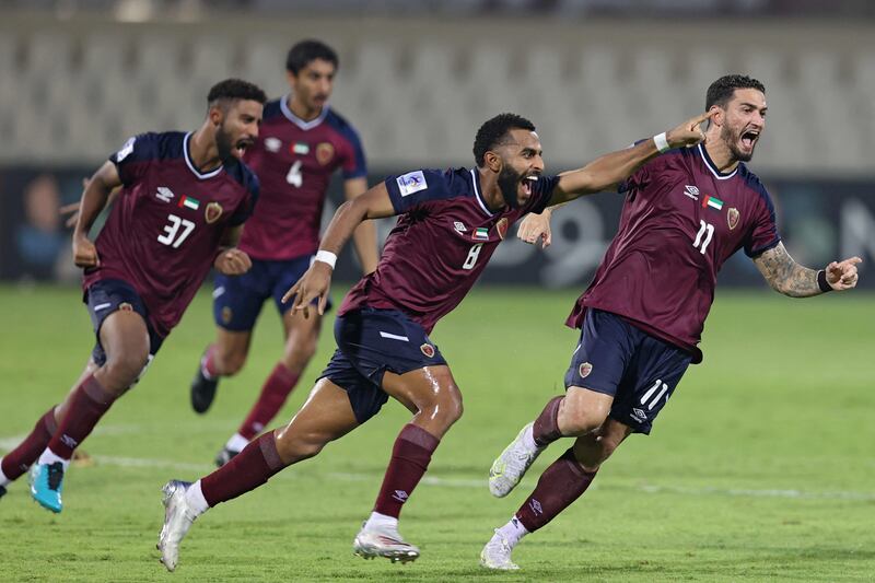Al Wahda players celebrate beating Sharjah in the Asian Champions League. AFP