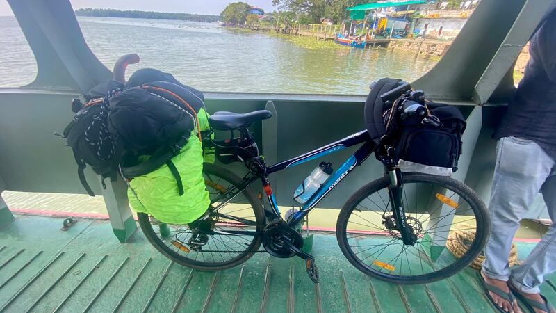 Crossing the Periyar river by ferry.