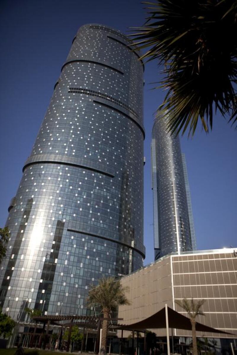 5. The Sky Tower, right, on Reem Island is fifth tallest at 292.2m The Sun Tower, left, also makes the list in 10th at 237.6m. Silvia Razgova / The National