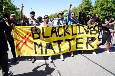 Supporters of the Black Lives Matter movement protest in front of the US Embassy to Denmark. EPA