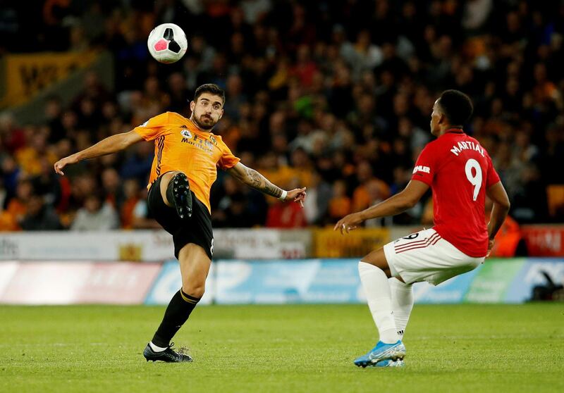 Wolverhampton Wanderers' Ruben Neves in action with Manchester United's Anthony Martial. Reuters