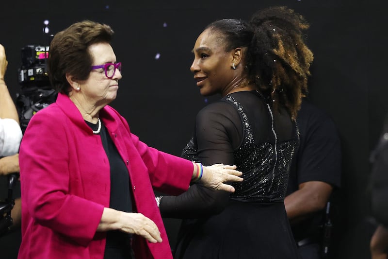 Serena Williams is greeted by Billie Jean King at the US Open. AFP