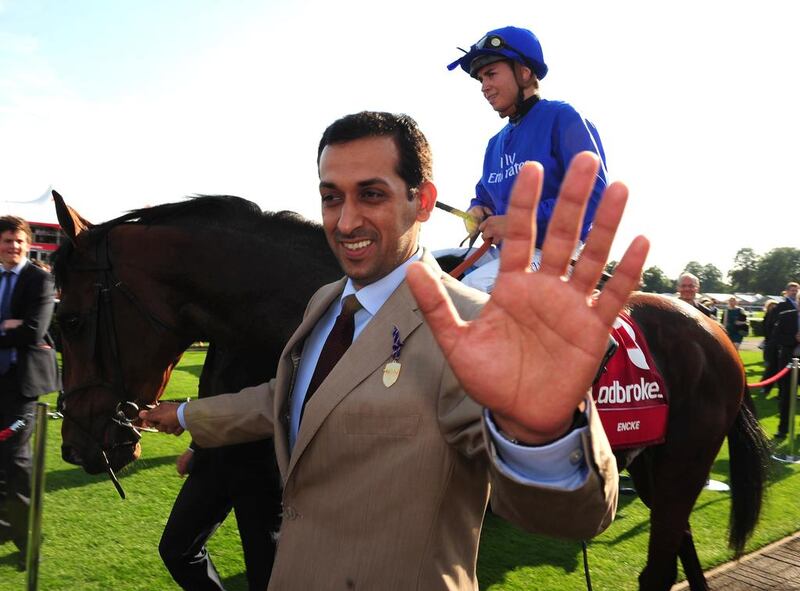 Horse trainer Mahmood Al Zarooni, who has been disqualified for eight years because of a doping scandal, with Encke after winning the English St Leger. Godolphin said Encke will return to the track later this year. Healy Racing / Racingfotos.com

