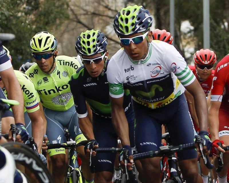 Colombian cyclist Nairo Quintana of Movistar Team with his brother and team-mate Dayer Quintana (C) compete next to Alberto Contador (L) of Tinkoff during the seventh and last stage of the 96th Volta a Catalunya cycling race, in Barcelona, on Sunday. Quique Garcia / EPA / March 27, 2016 