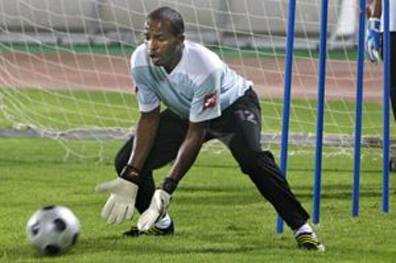 The Al Ain keeper, Waleed Salem, trains with his team at Sheikh Khalifa bin Zayed Stadium.