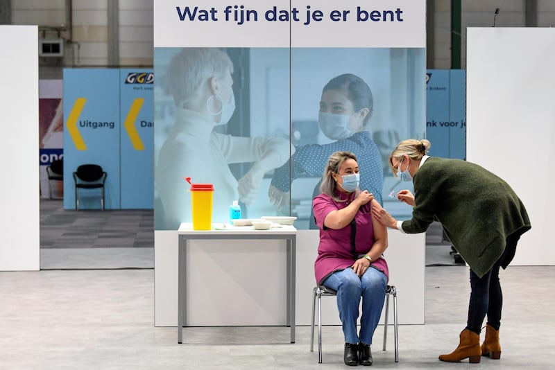39 year old nursing home worker Sanna Elkadiri receives the first Pfizer-BioNTech vaccine in the Netherlands, in Veghel. Reuters