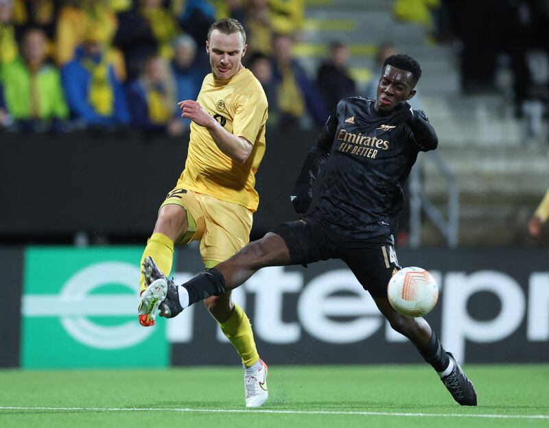 Bodo / Glimt's Marius Lode in action with Arsenal's Eddie Nketiah. Action Images