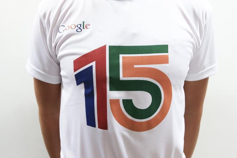 A special edition 15th anniversary t shirt is worn by an employee at the Google office in Dubai Media City. Sarah Dea / The National