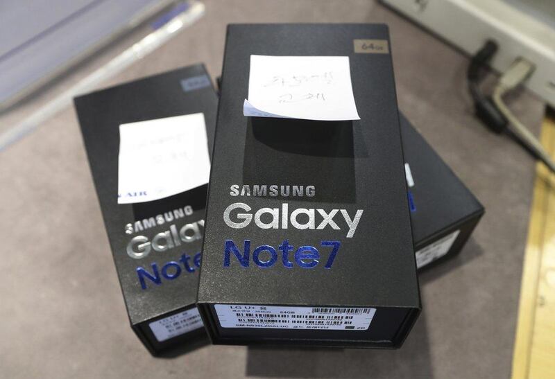 Returned boxes of Samsung's Galaxy Note 7 smartphones are placed at a shop of South Korean mobile carrier in Seoul. Lee Jin-man / AP Photo