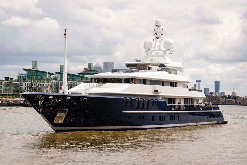 The luxury 68m superyacht 'Triple Seven,' owned by Alexander Abramov, on the River Thames in London. EPA