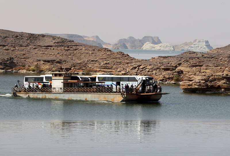 Sudan evacuees cross the Nile on a ferry taking them to Abu Simbel city, Egypt. Reuters