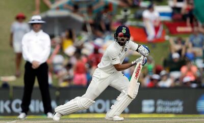 India's captain Virat Kohli watches his shot during the second day of the second cricket test match between South Africa and India at Centurion Park in Pretoria, South Africa, Sunday, Jan. 14, 2018. (AP Photo/Themba Hadebe)