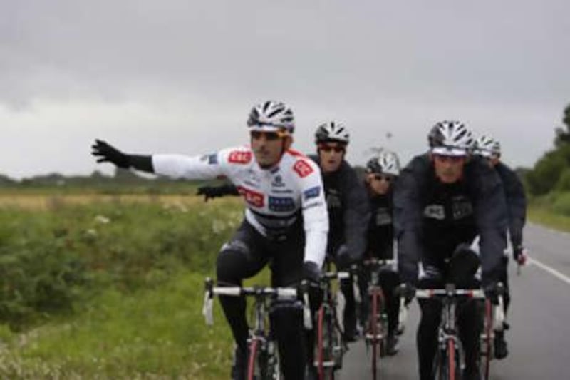Fabian Cancellara (left) trains with team mates ahead of the Tour de France.