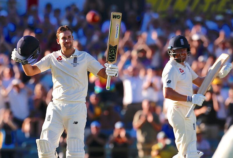 Cricket - Ashes test match - Australia v England - WACA Ground, Perth, Australia, December 14, 2017. England's Dawid Malan celebrates with team mate Jonny Bairstow after reaching his century during the first day of the third Ashes cricket test match.    REUTERS/David Gray