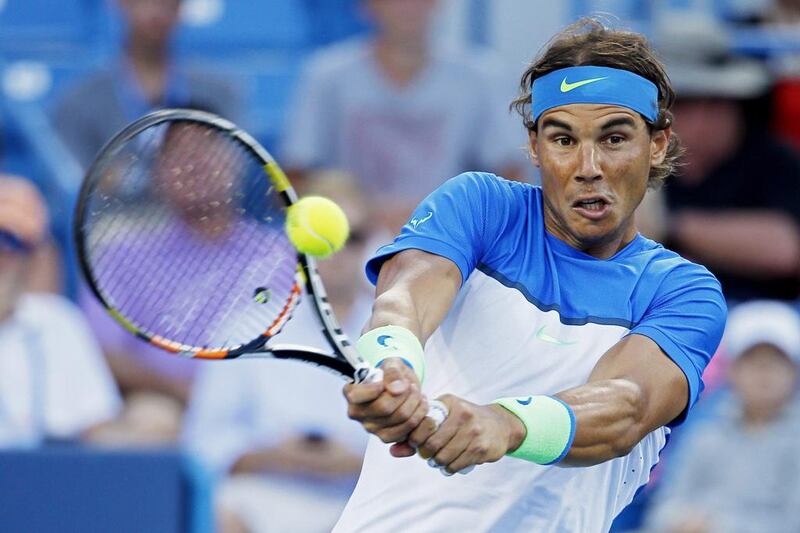 Rafael Nadal is continuing to struggle this season but Roger Federer and Andy Murray both back the Spaniard to battle his way through it all. John Minchillo / AP Photo