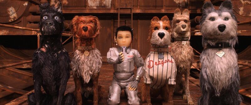 This image released by Fox Searchlight Pictures shows characters, from left, Chief, voiced by Bryan Cranston, King, voiced by Bob Balaban, Atari Kobayashi, voiced Koyu Rankin, Boss, voiced  by Bill Murray, Rex, voiced by Edward Norton, And Duke, voiced by Jeff Goldblum, in a scene from "Isle of Dogs." (Fox Searchlight via AP)Koyu Rankin