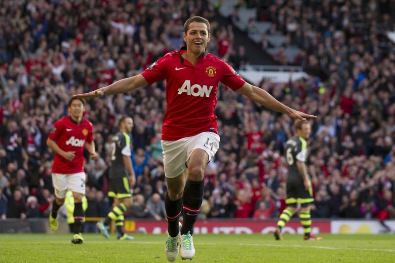 Manchester United's Javier Hernandez celebrates after scoring the winner against Stoke during their English Premier League  match at Old Trafford. Jon Super / AP