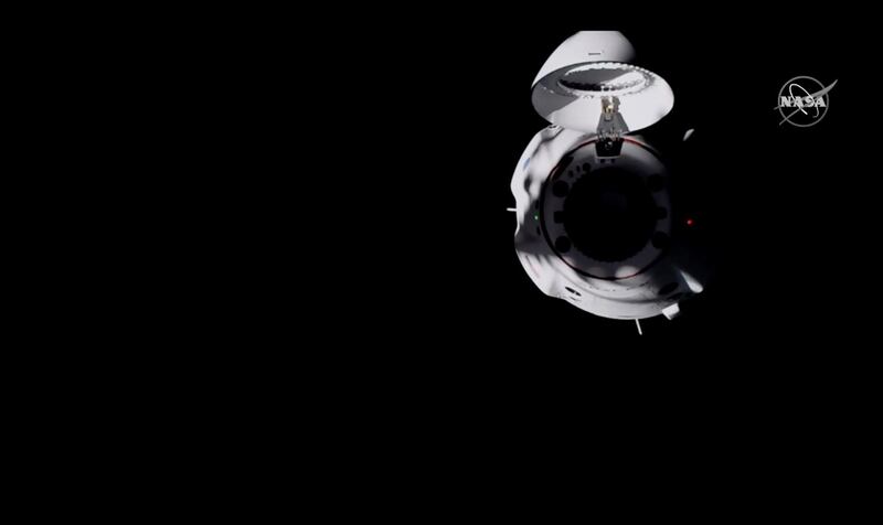 the SpaceX Dragon capsule approaches the International Space Station. Nasa TV / AP