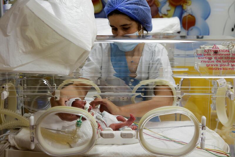 A nurse takes care of one of the nonuplets at the Ain Borja clinic in Casablanca, Morocco. Reuters