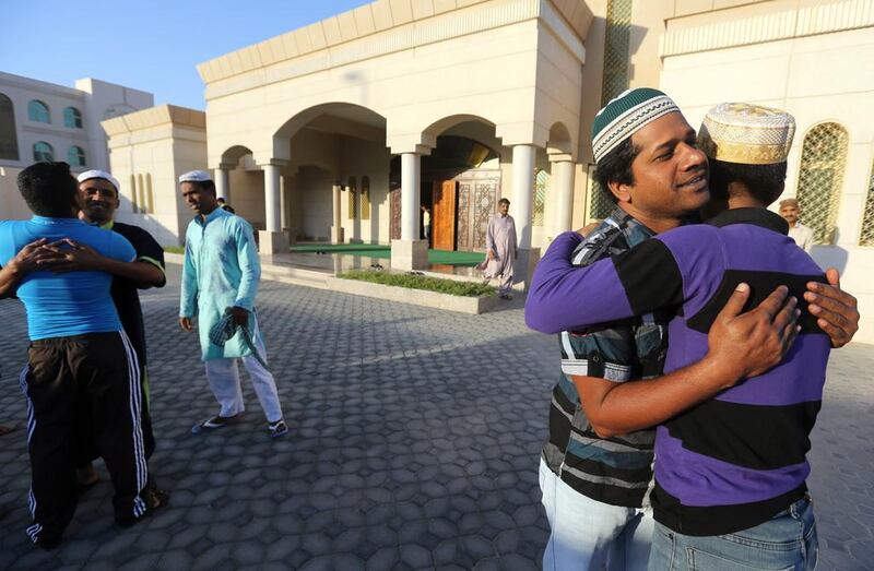 Worshipers gather at the Khalifia City Mosque for the Eid Al Adha prayers in Abu Dhabi. Sammy Dallal / The National