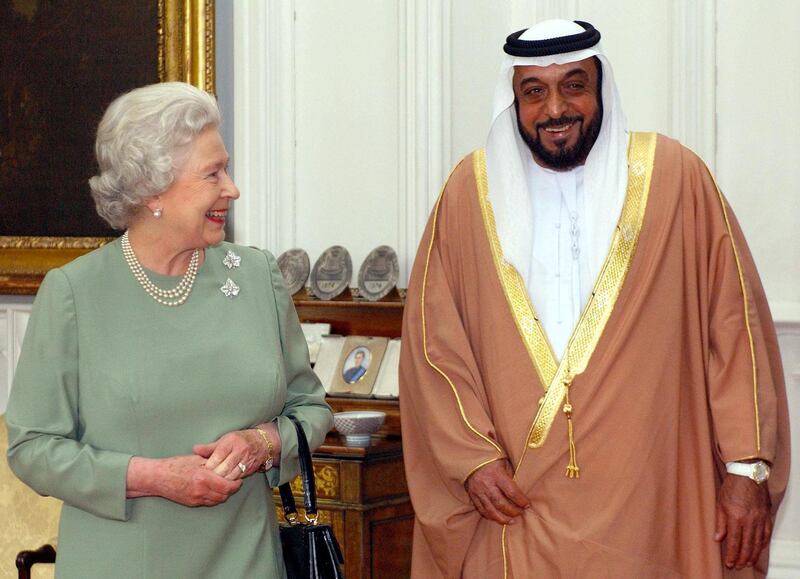 Britain's Queen Elizabeth II (L) meets with his Highness Shaikh Khalifa bin Zayed al Nayhan, Crown Prince of Abu Dhabi, who she invited for tea, 06 June 2003, at Windsor Castle.  AFP PHOTO/POOL/Kirsty Wigglesworth (Photo by KIRSTY WIGGLESWORTH / POOL / AFP)