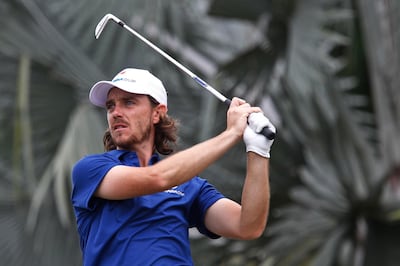 Tommy Fleetwood of England tees off at the 10th hole during the singles matches of the EurAsia Cup golf tournament at Glenmarie Golf & Country Club in Shah Alam, Malaysia, Sunday, Jan. 14, 2018. (AP Photo/Sadiq Asyraf)