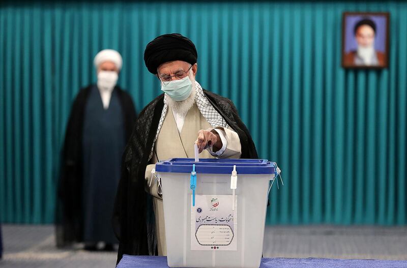 Iran's supreme leader Ayatollah Ali Khamenei casts his ballot for the presidential elections, in Tehran. AP Photo