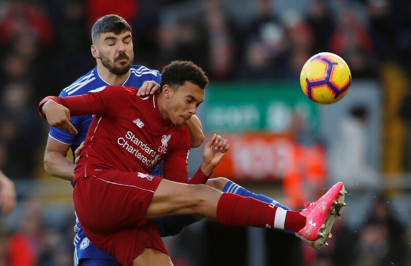 Liverpool's Trent Alexander-Arnold in action with Cardiff City's Callum Paterson. Reuters