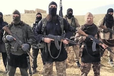 ISIS propaganda photo showing masked militants in Syria.