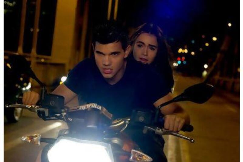 'Twilight' star Taylor Lautner will celebrate his 30th birthday in 2022. He is seen here with Lily Collins star in the action-thriller 'Abduction'. Photo: DataBean