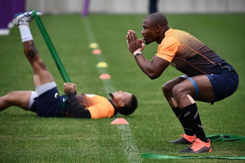 South Africa's wing Makazole Mapimpi (R) and South Africa's fly-half Elton Jantjies take part in a training session Fuchu Asahi Football Park in Tokyo ahead of their Japan 2019 Rugby World Cup semi-final against Wales. AFP