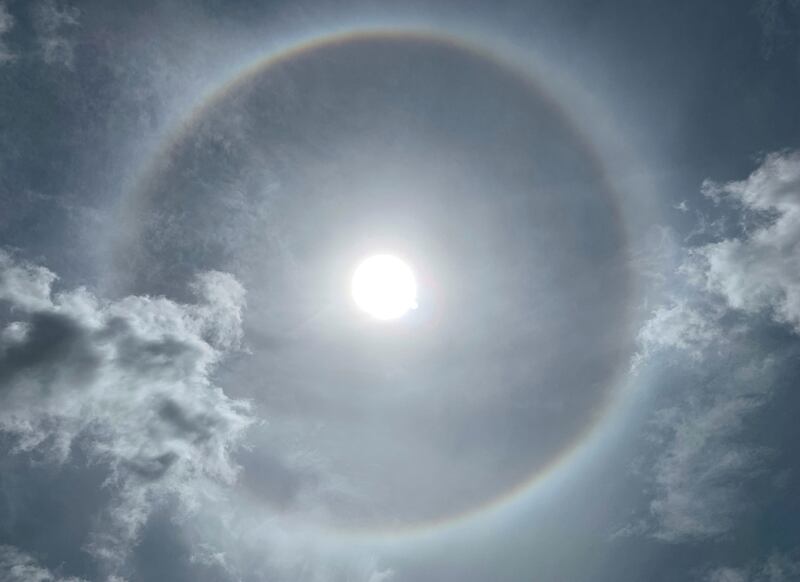 A solar halo surrounds the sun over Bangkok. AFP