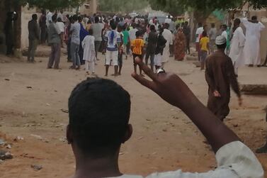 A Sudanese protester gestures during an anti-government demonstration in Khartoum on February 15, 2019. AFP