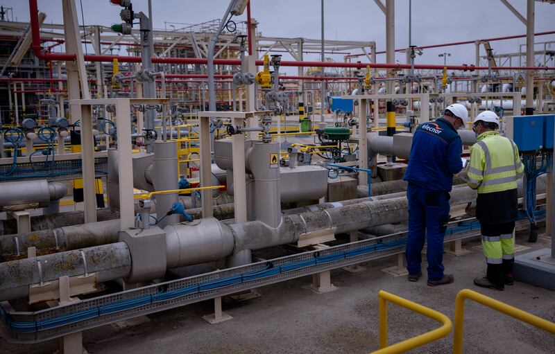 Operators work at Enagas regasification plant, the largest LNG plant in Europe, in Barcelona. AP