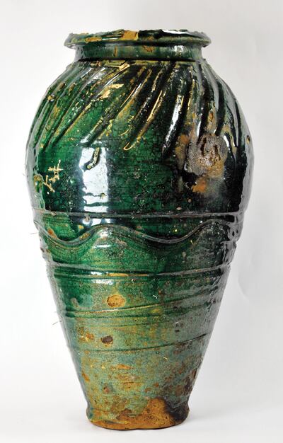 One of the green-glazed jars found around the ship with some containing Indian peppercorns. Courtesy Enigma Recoveries
